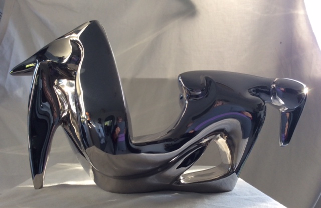stainless-steel figurative table top sculpture