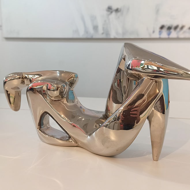 stainless-steel figurative table top sculpture