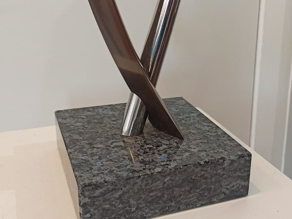 bronze minimalist sculpture granite base