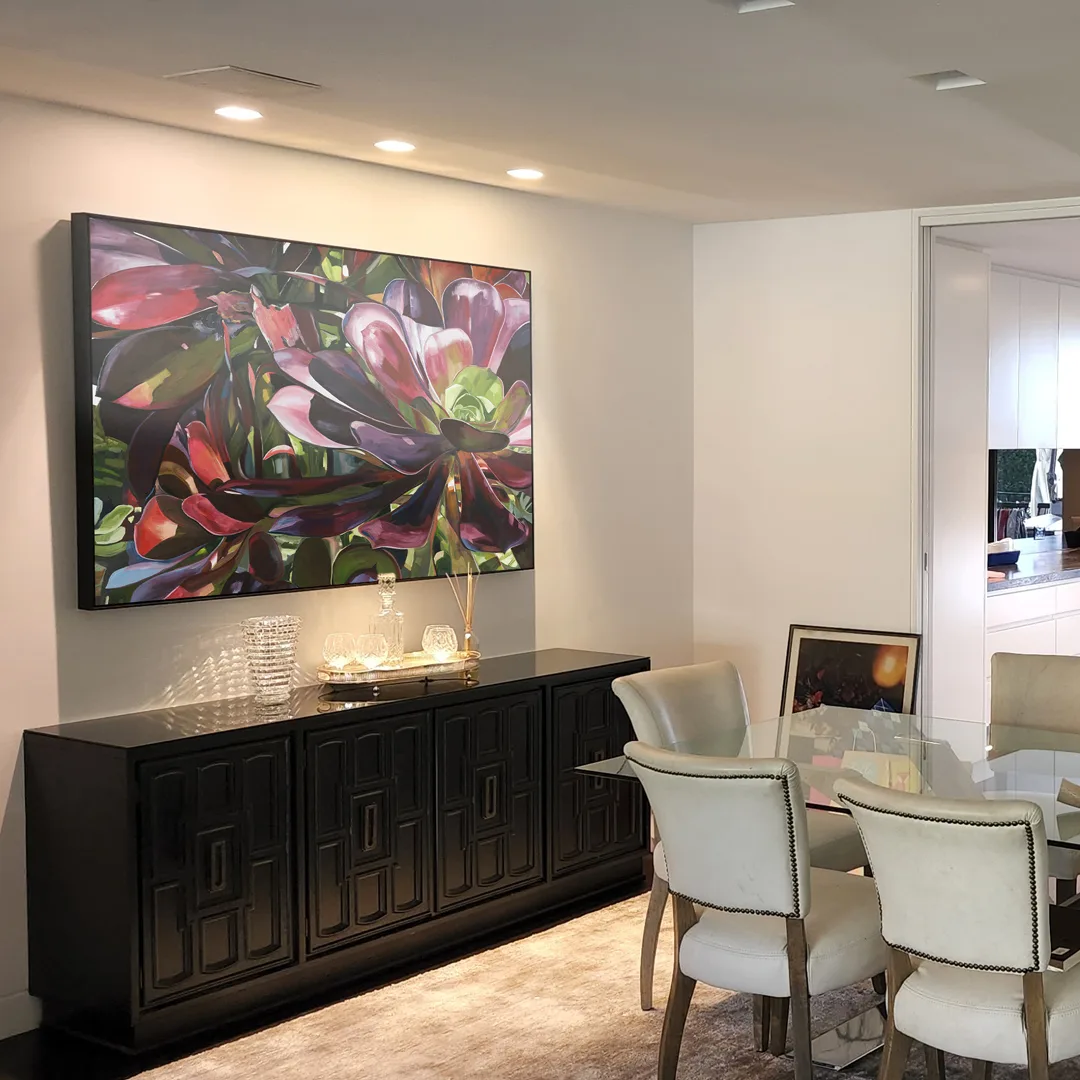 Dining Room Art Red Succulent by Marisha Matthews above a black sideboard in a dining room